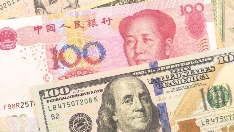 中国要求银行限制美元购买，以应对人民币贬值至多年低点。